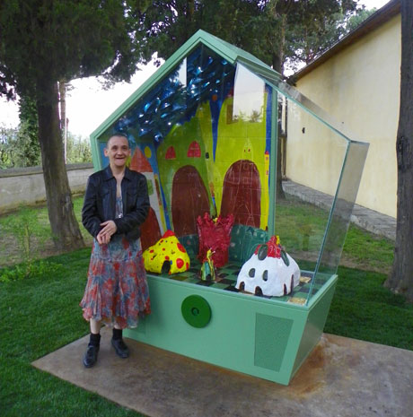 Sandra Tomboloni with her artwork